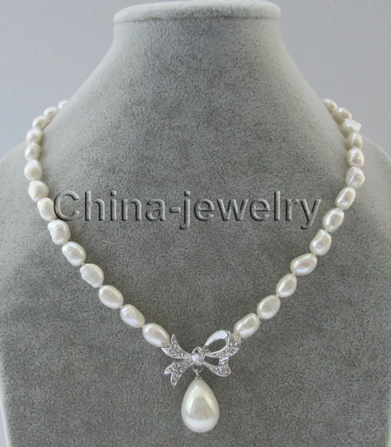 Beautiful 9-12mm white baroque freshwater pearl necklace 17 " + 16mm shell pearl pendant
Beautiful 9-12mm white baroque freshwater pearl necklace 17 " + 16mm shell pearl pendant