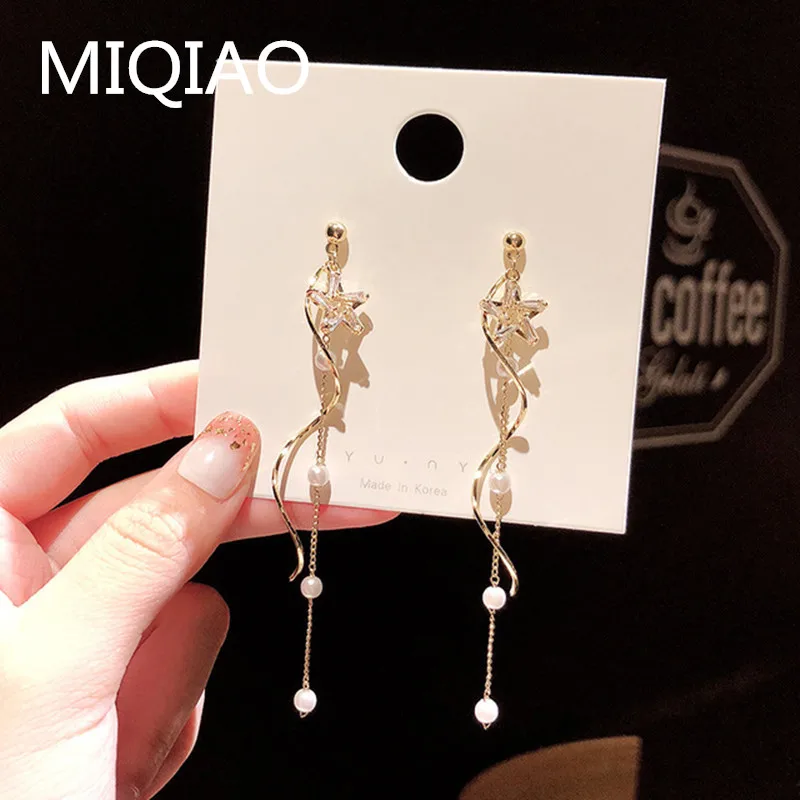Earrings silvery needle Earrings European and American exaggerated retro Pearl Earrings female tassel long earrings
Earrings silvery needle Earrings European and American exaggerated retro Pearl Earrings female tassel long earrings