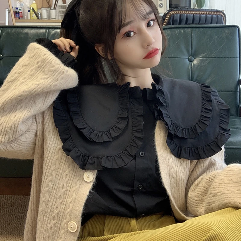 2020 Korean Vintage Blouse Women Peter pan Collar Long sleeve Ruffles White black shirt Female overisized blouse chemisier femme
2020 Korean Vintage Blouse Women Peter pan Collar Long sleeve Ruffles White black shirt Female overisized blouse chemisier femme