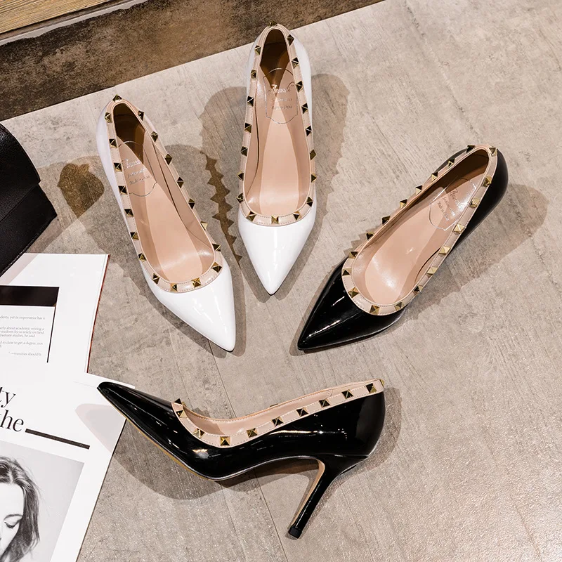 Spring new rivet high heels women's fine heel professional work shoes tip light single shoes
Spring new rivet high heels women's fine heel professional work shoes tip light single shoes