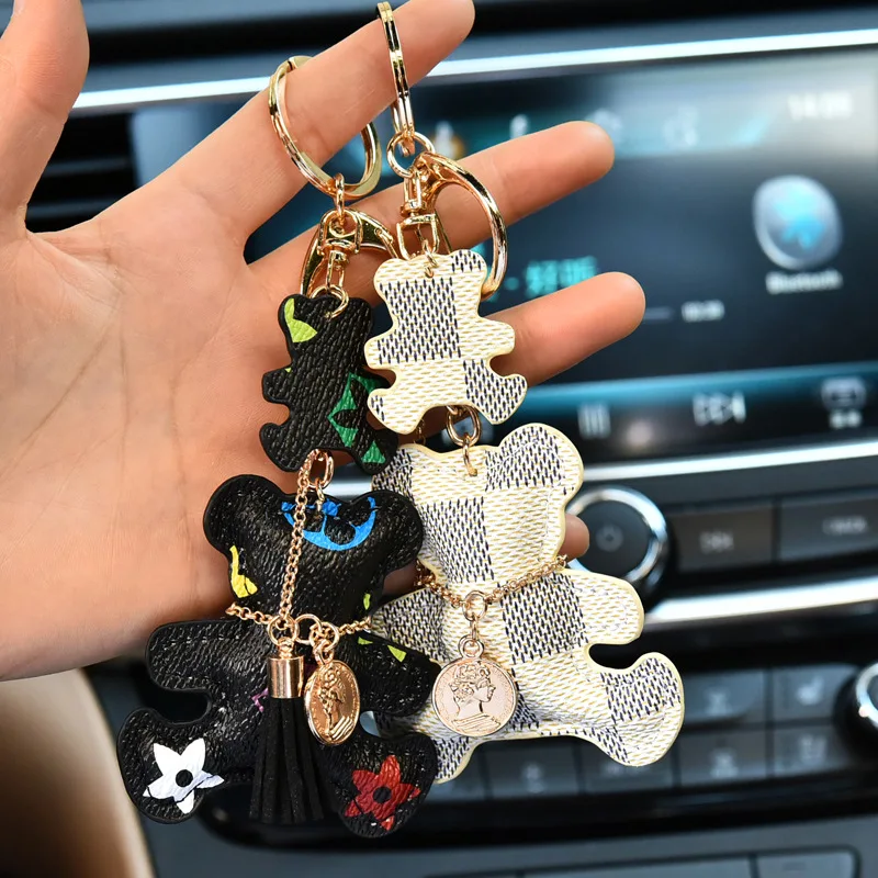 New Trend Creative Keychain For Men and Women Couple Flower Bear Keychain Personality Bears Leather Keychain Car Keyring Pendant
New Trend Creative Keychain For Men and Women Couple Flower Bear Keychain Personality Bears Leather Keychain Car Keyring Pendant