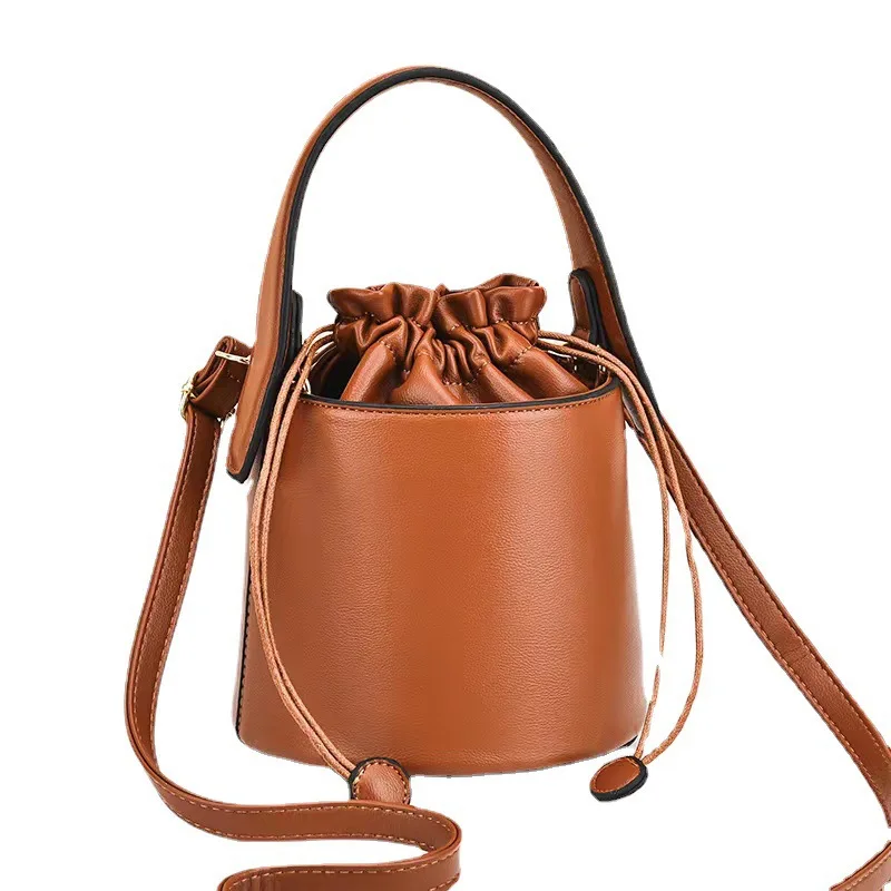 2022 New Fashion Small Bucket Bag Handbag Retro Street Trend Texture Drawstring Shoulder Messenger Bag
2022 New Fashion Small Bucket Bag Handbag Retro Street Trend Texture Drawstring Shoulder Messenger Bag