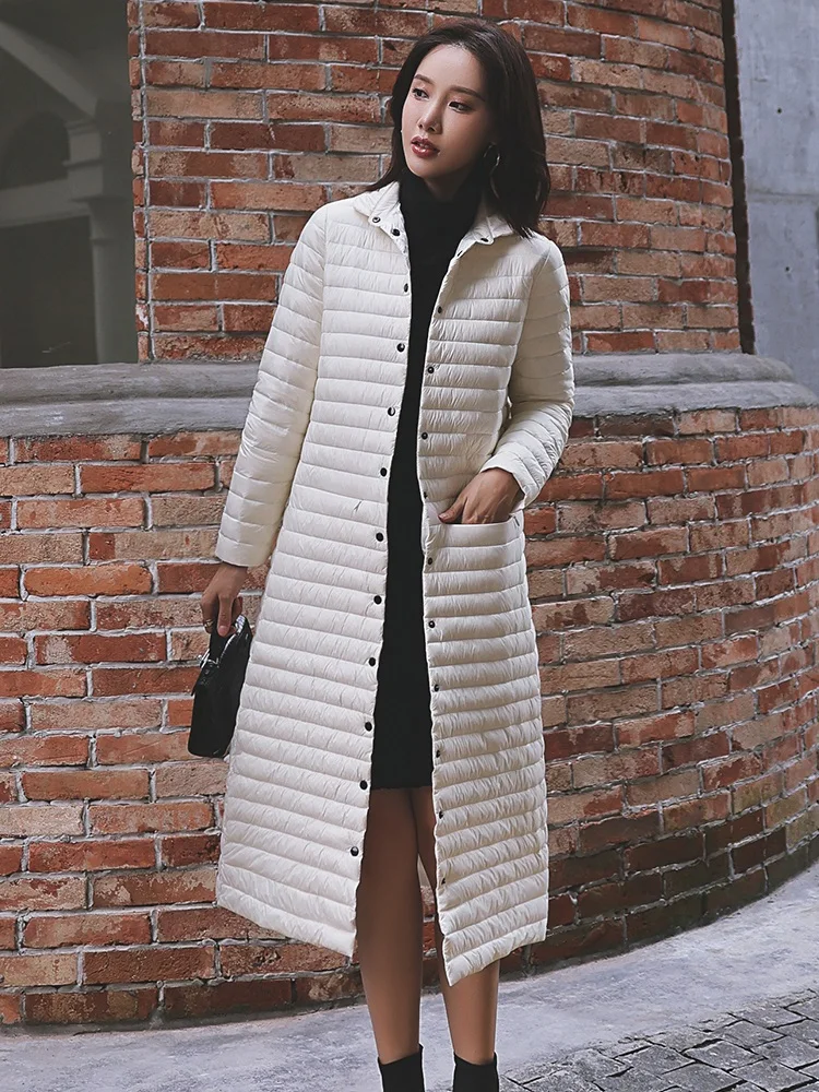 New Lightweight Long Down Coat Women Autumn Winter 2021 Elegant Fashion Stand Collar Solid Color Slim White Duck Down Coat
New Lightweight Long Down Coat Women Autumn Winter 2021 Elegant Fashion Stand Collar Solid Color Slim White Duck Down Coat