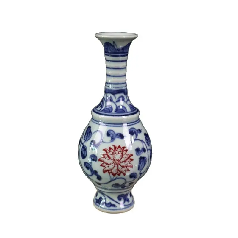 Китайская старинная фарфоровая сине-белая подглазурная ваза с красным лотосом
Китайская старинная фарфоровая сине-белая подглазурная ваза с красным лотосом