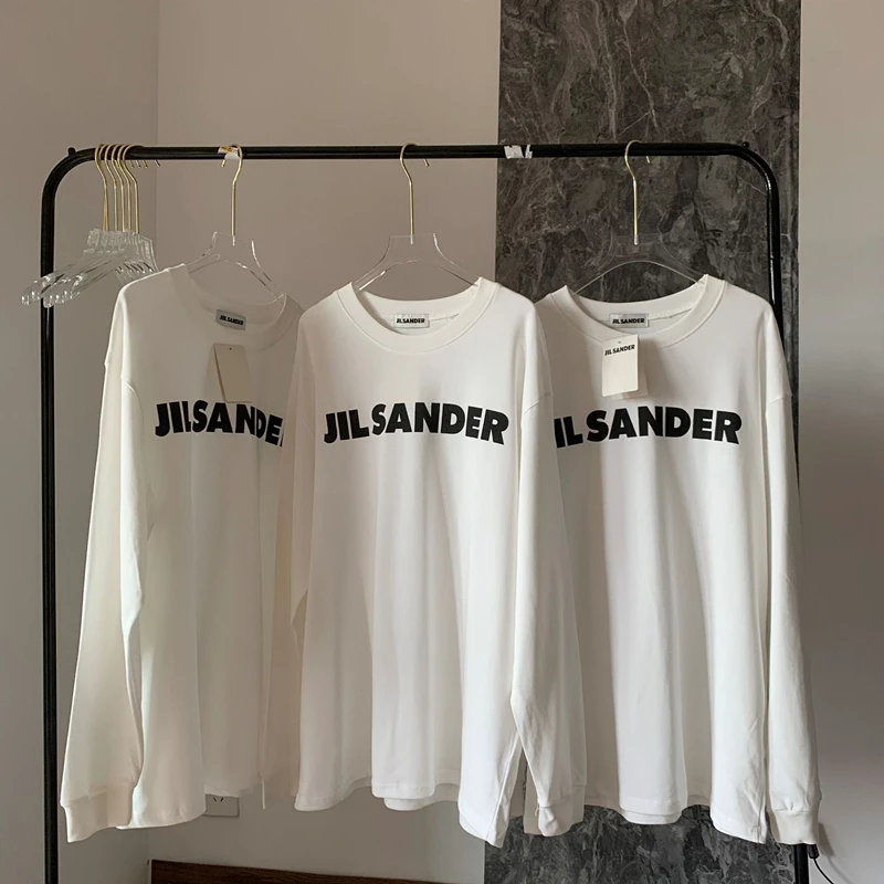 2021 New White Long-sleeved Custom Logo JIL SANDER Letter Printing High Street Casual Loose Oversize Couple Round Neck Sweater
2021 New White Long-sleeved Custom Logo JIL SANDER Letter Printing High Street Casual Loose Oversize Couple Round Neck Sweater