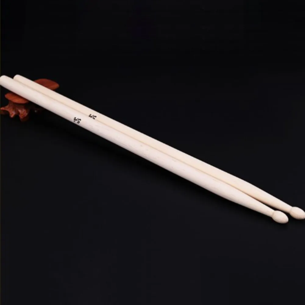 One Pair Professional 5A Drum Sticks Maple Wood Drumsticks Musical Instruments Anti-slip Grip Drumsticks
One Pair Professional 5A Drum Sticks Maple Wood Drumsticks Musical Instruments Anti-slip Grip Drumsticks