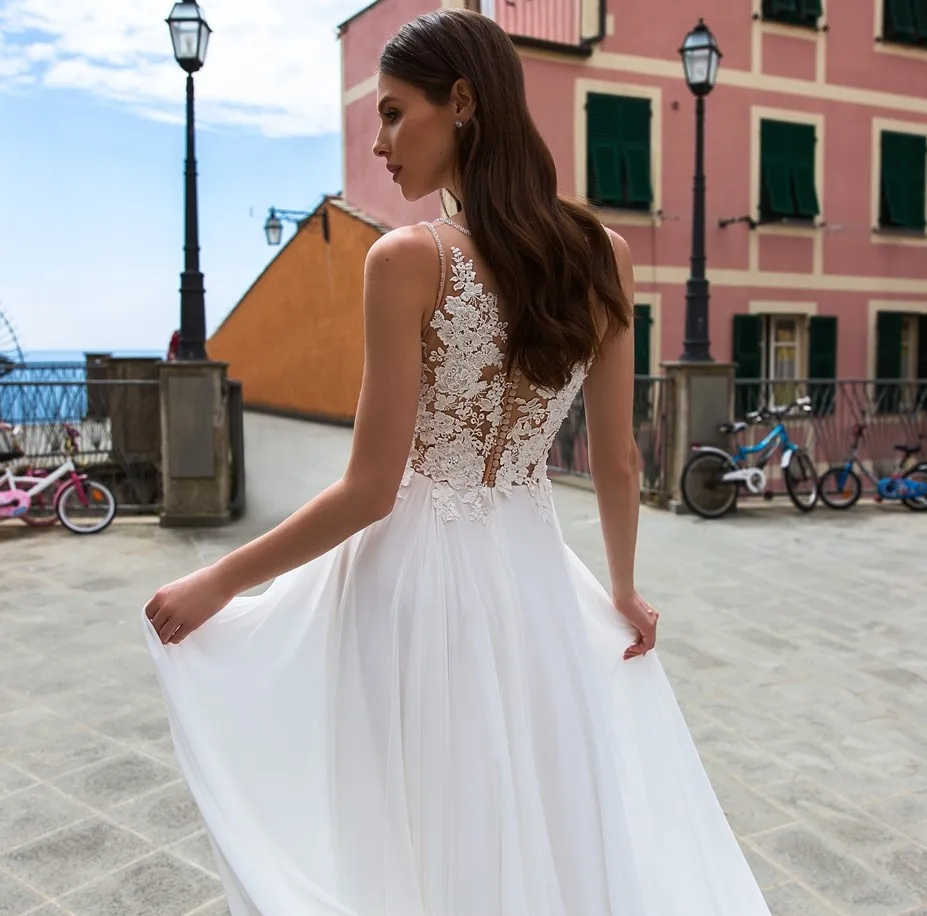 A-Line V-Neck Sexy Wedding Dresses African Lace Appliques Sweep Train Simple Bride Dress
A-Line V-Neck Sexy Wedding Dresses African Lace Appliques Sweep Train Simple Bride Dress