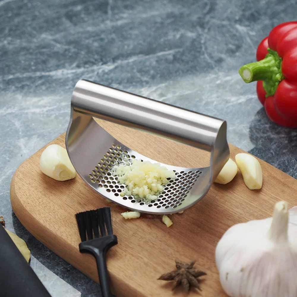 1Pc Stainless Steel Garlic Press Handle Rocker Garlic Curved Crusher Squeezer Mincer Fruit Vegetable Tool Chopper Kitchen Gadget
1Pc Stainless Steel Garlic Press Handle Rocker Garlic Curved Crusher Squeezer Mincer Fruit Vegetable Tool Chopper Kitchen Gadget