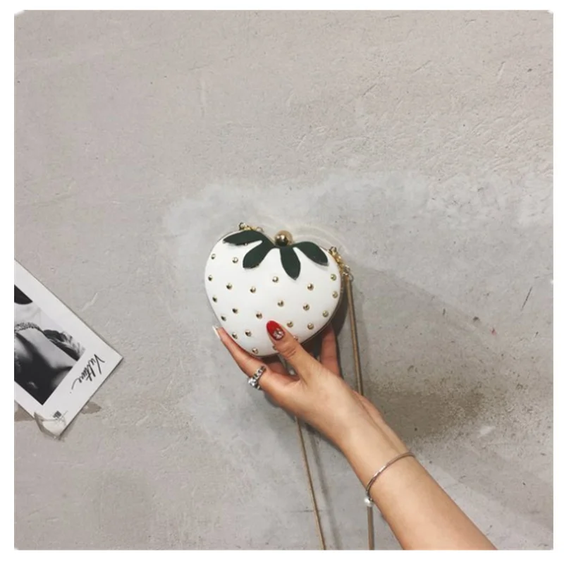 Summer fashion girl cute strawberry bag xiaoqingxin messenger bag rivet snake bone chain bag girl
Summer fashion girl cute strawberry bag xiaoqingxin messenger bag rivet snake bone chain bag girl