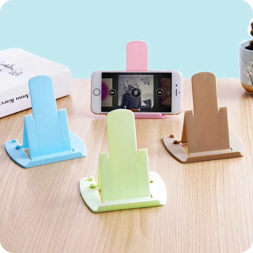 Portable Mini Mobile Phone Holder Foldable Desk Stand Holder2 degree Adjustable Universal Shelf Rack for iPhone Andorid Phone
Portable Mini Mobile Phone Holder Foldable Desk Stand Holder2 degree Adjustable Universal Shelf Rack for iPhone Andorid Phone
