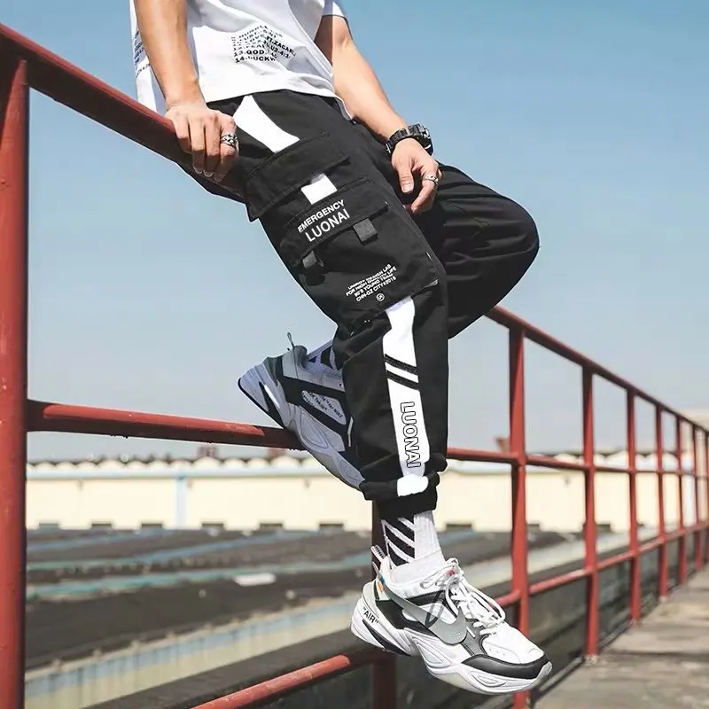 Hip Hop Ribbons Cargo Pants Men Joggers Pants Mens Streetwear Military Pants 2020 Fashion Male Elastic Waist Pant Cotton Black
Hip Hop Ribbons Cargo Pants Men Joggers Pants Mens Streetwear Military Pants 2020 Fashion Male Elastic Waist Pant Cotton Black