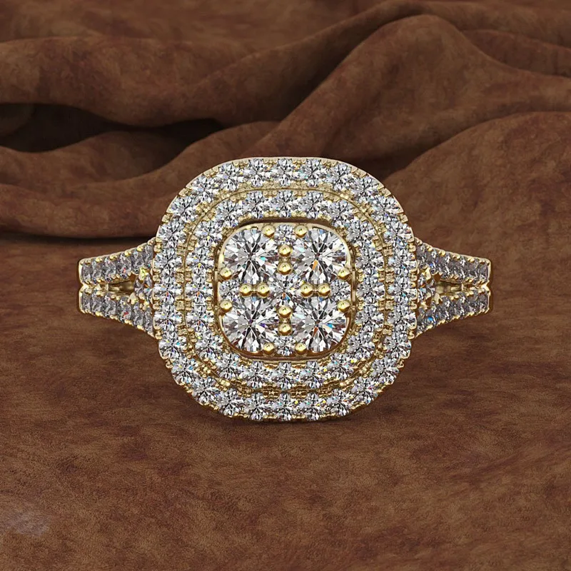 Женское кольцо с кристаллами классическое золотистое квадратным фианитом |