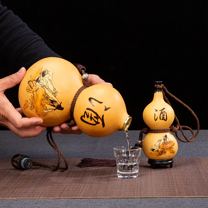 Natural Gourd crafts handmade Liquor container home decorations creative water bottle flagon Artwork wood crafts chic ornaments
Natural Gourd crafts handmade Liquor container home decorations creative water bottle flagon Artwork wood crafts chic ornaments