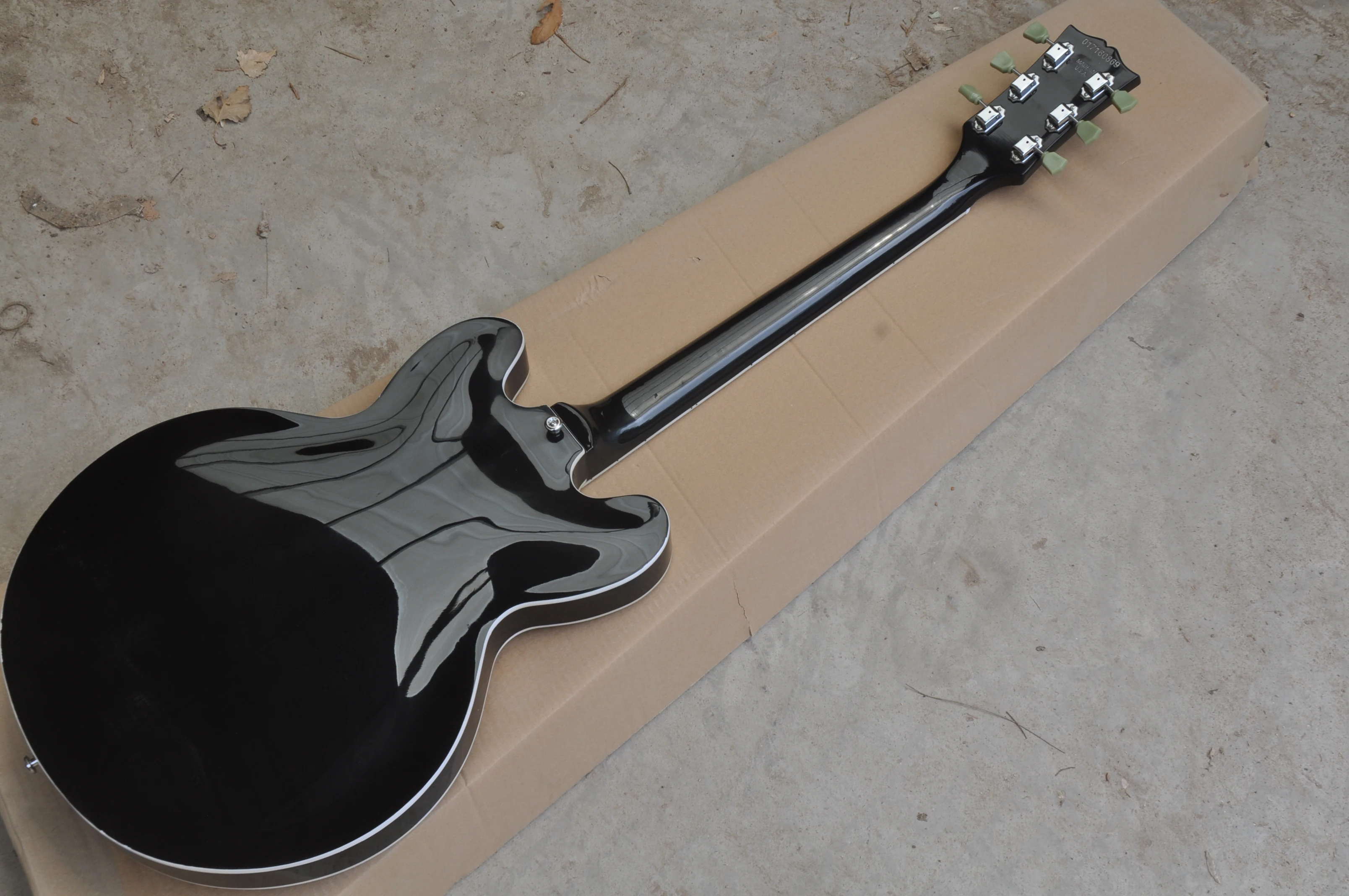 Chinese guitar factory custom 335 half hollow double f-hole body black electric guitar in stock 62
Chinese guitar factory custom 335 half hollow double f-hole body black electric guitar in stock 62