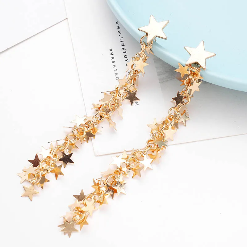 Exaggerated metal stars earrings female Korean temperament long five-pointed star tassel net red 
Exaggerated metal stars earrings female Korean temperament long five-pointed star tassel net red