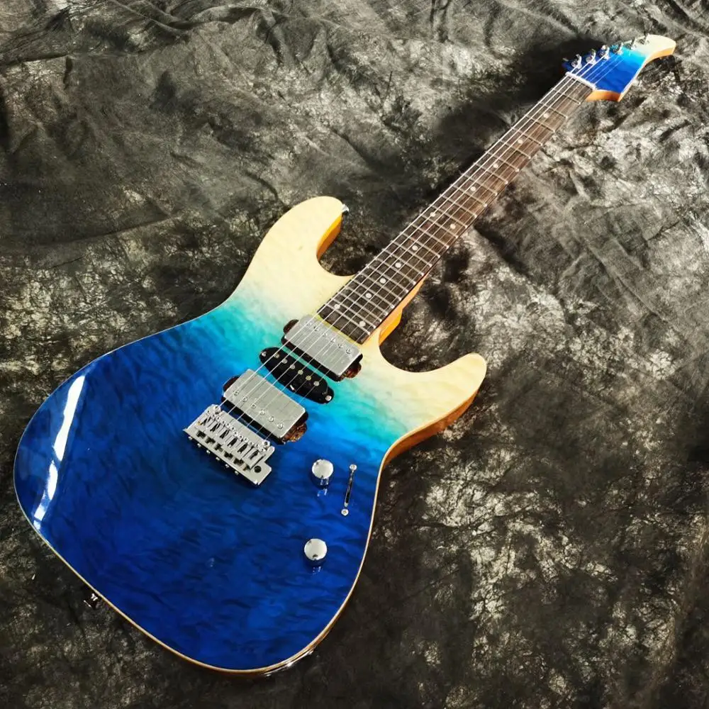 New style electric guitar,rosewood fingerboard guitarra,high quality pickup.blue color flame maple top 6 stings .real photos
New style electric guitar,rosewood fingerboard guitarra,high quality pickup.blue color flame maple top 6 stings .real photos