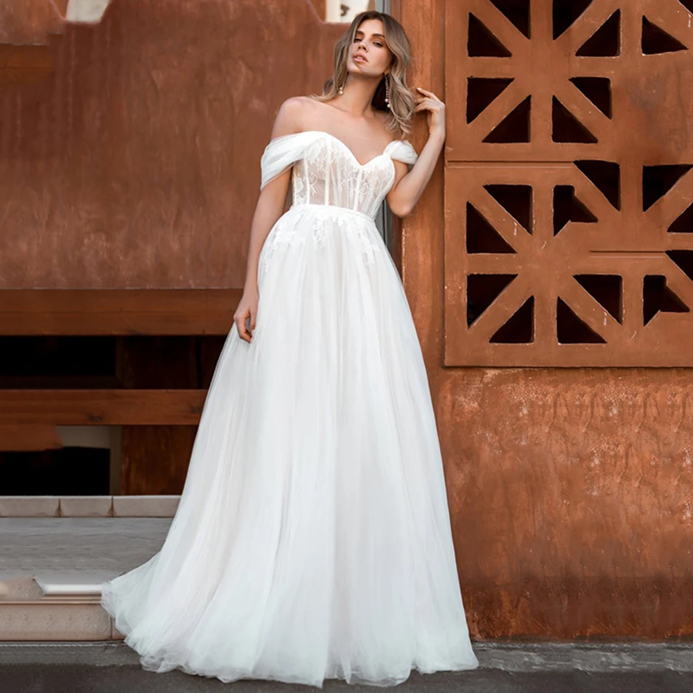 Elegant Princesa Wedding Dresses A-Line Custom Made Zipper Sweetheart Tulle Skirt Off Shoulder Corset 2021 Robe De Mariée
Elegant Princesa Wedding Dresses A-Line Custom Made Zipper Sweetheart Tulle Skirt Off Shoulder Corset 2021 Robe De Mariée