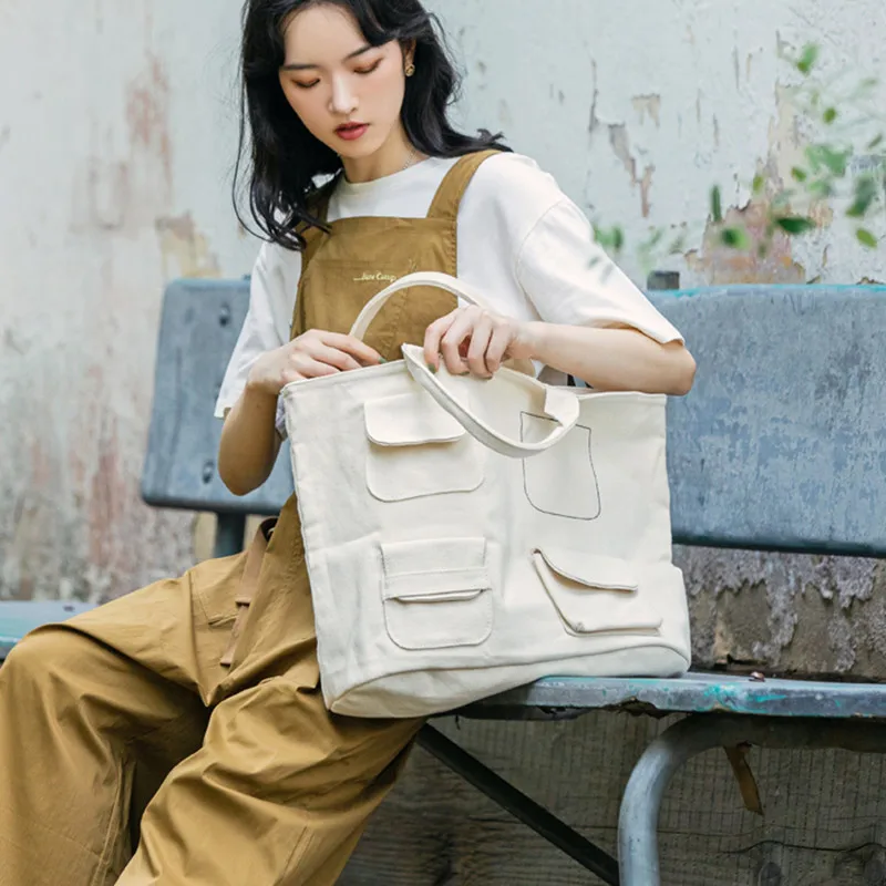 Вместительные холщовые сумки на плечо для женщин, 2021, в японском и корейском стиле, большие сумки на плечо и кошельки, однотонные сумки-тоуты...
Вместительные холщовые сумки на плечо для женщин, 2021, в японском и корейском стиле, большие сумки на плечо и кошельки, однотонные сумки-тоуты...