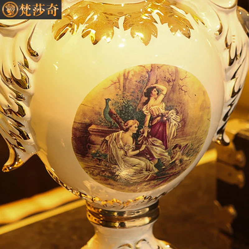 The new large ceramic vase decoration luxury European gilt figures of modern living room decoration flower
The new large ceramic vase decoration luxury European gilt figures of modern living room decoration flower
