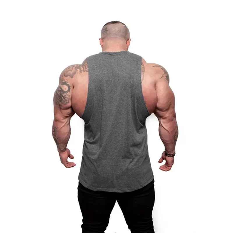 Mens Bodybuilding Tank top Gyms Fitness Clothing Cotton Sleeveless Shirt Slim fit Vest Male Plain Stringer Singlet Undershirt
Mens Bodybuilding Tank top Gyms Fitness Clothing Cotton Sleeveless Shirt Slim fit Vest Male Plain Stringer Singlet Undershirt