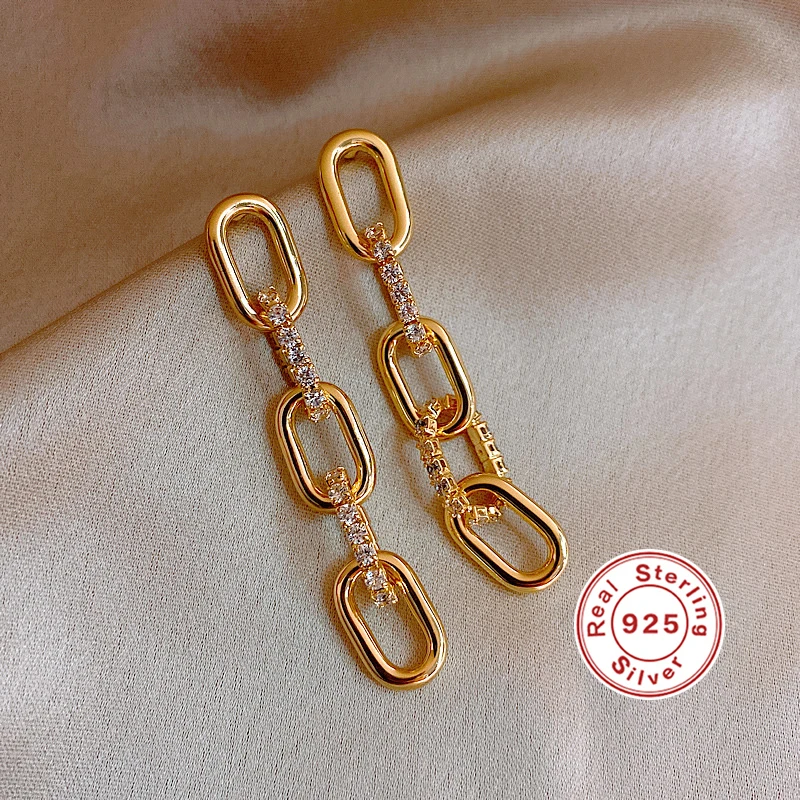 925 silver needle cold wind metal chain inlaid diamond earrings retro Earrings personalized fashion earrings for women
925 silver needle cold wind metal chain inlaid diamond earrings retro Earrings personalized fashion earrings for women