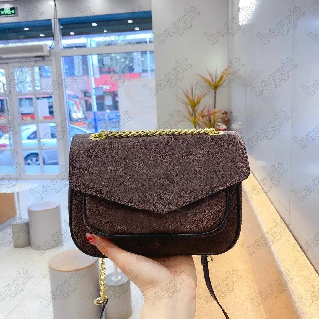 Женские сумки-мессенджеры с цепочкой и застежкой, модные кожаные сумки с цветочным рисунком, сумки через плечо с клапаном
Женские сумки-мессенджеры с цепочкой и застежкой, модные кожаные сумки с цветочным рисунком, сумки через плечо с клапаном