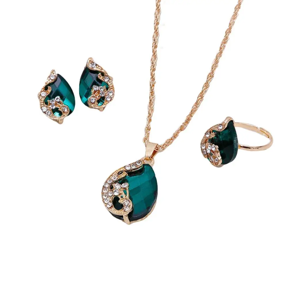 Women Rhinestone Peacock Water Drop Pendant Necklace Earrings Ring Jewelry Set
Women Rhinestone Peacock Water Drop Pendant Necklace Earrings Ring Jewelry Set