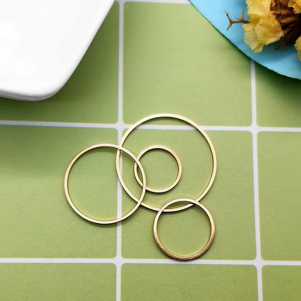 70 pieces of earrings round Brass closed ring pendant copper ring frame for jewelry making 
70 pieces of earrings round Brass closed ring pendant copper ring frame for jewelry making