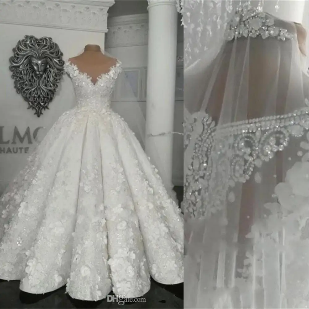 Luxury Wedding Dresses Jewel Neck Illusion Crystal Beads 3D Flowers Cap Sleeves Arabic Bridal Gowns Middle East Vestido De Novia
Luxury Wedding Dresses Jewel Neck Illusion Crystal Beads 3D Flowers Cap Sleeves Arabic Bridal Gowns Middle East Vestido De Novia