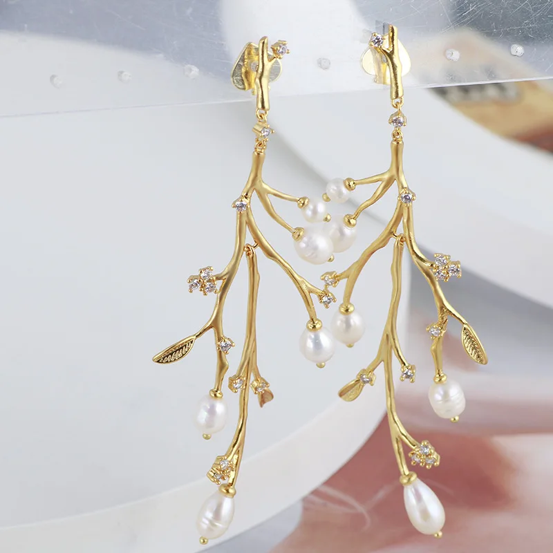 European and American jewelry wholesale retro fashion freshwater pearl golden leaf personality exaggerated earrings earrings
European and American jewelry wholesale retro fashion freshwater pearl golden leaf personality exaggerated earrings earrings