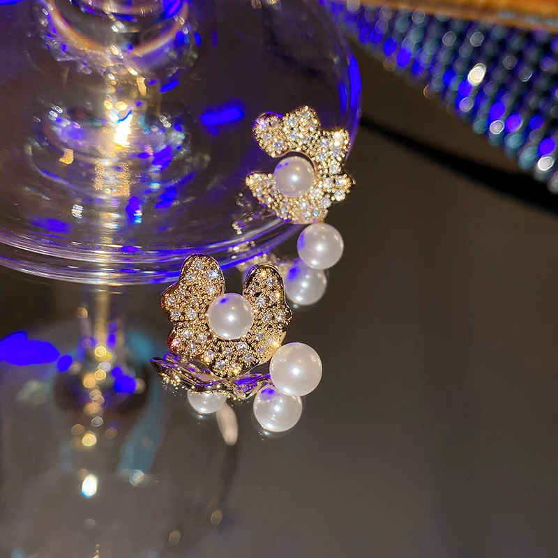 Real gold electroplating 925 silver needle irregular Pearl Flower Earrings Korean simple Earrings Gold Plated Diamond Earrings 
Real gold electroplating 925 silver needle irregular Pearl Flower Earrings Korean simple Earrings Gold Plated Diamond Earrings