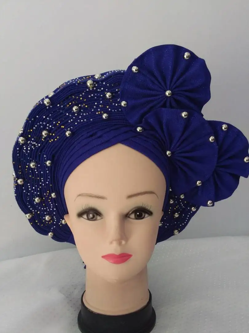 Porpular красивый дизайн синий африканский Aso Ebi головной убор круглые камни/Бисер Авто Gele женские для свадьбы Вечерние ринки материалы KK-1
Porpular красивый дизайн синий африканский Aso Ebi головной убор круглые камни/Бисер Авто Gele женские для свадьбы Вечерние ринки материалы KK-1