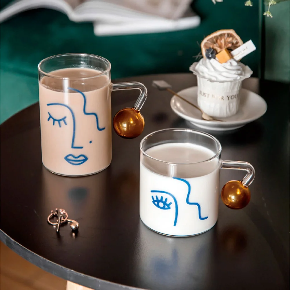 Drinking Water Glasses Cup Spherical Handle Breakfast Home Office Milk Tea Coffee Cup Face Art Glassware Heat Resistant
Drinking Water Glasses Cup Spherical Handle Breakfast Home Office Milk Tea Coffee Cup Face Art Glassware Heat Resistant
