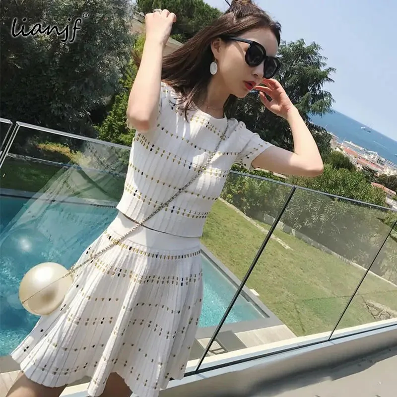 Summer Hollow Out A-line Skirts Knit Top + Skirt Two Pieces Korean Short High Waist Ice Silk Knitted Dress Suit Style Sexy Dress
Summer Hollow Out A-line Skirts Knit Top + Skirt Two Pieces Korean Short High Waist Ice Silk Knitted Dress Suit Style Sexy Dress