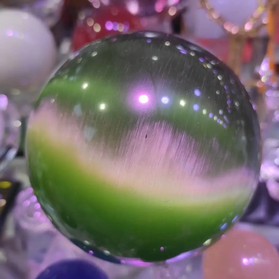 1pcs 60mm Cat Eye Crystal Ball Green Cat'S-Eye Opal Natural Quartz Crystal Stone Ball Sphere Ornament Home Office Decor Crafts 
1pcs 60mm Cat Eye Crystal Ball Green Cat'S-Eye Opal Natural Quartz Crystal Stone Ball Sphere Ornament Home Office Decor Crafts