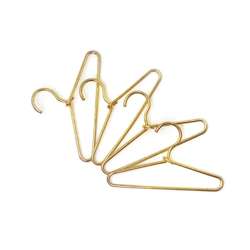 4pcs 1:12 Miniature Dollhouse Clothing Hangers Bedroom Wardrobe Decor Doll House Accessories Gift 
4pcs 1:12 Miniature Dollhouse Clothing Hangers Bedroom Wardrobe Decor Doll House Accessories Gift