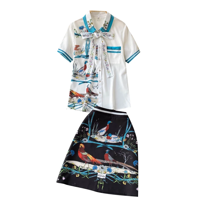 Women's Bow Lapel Short Sleeve Print Elegant Shirt Tops + High Waist Print A-line Short Skirt Two Piece Sets R711
Women's Bow Lapel Short Sleeve Print Elegant Shirt Tops + High Waist Print A-line Short Skirt Two Piece Sets R711