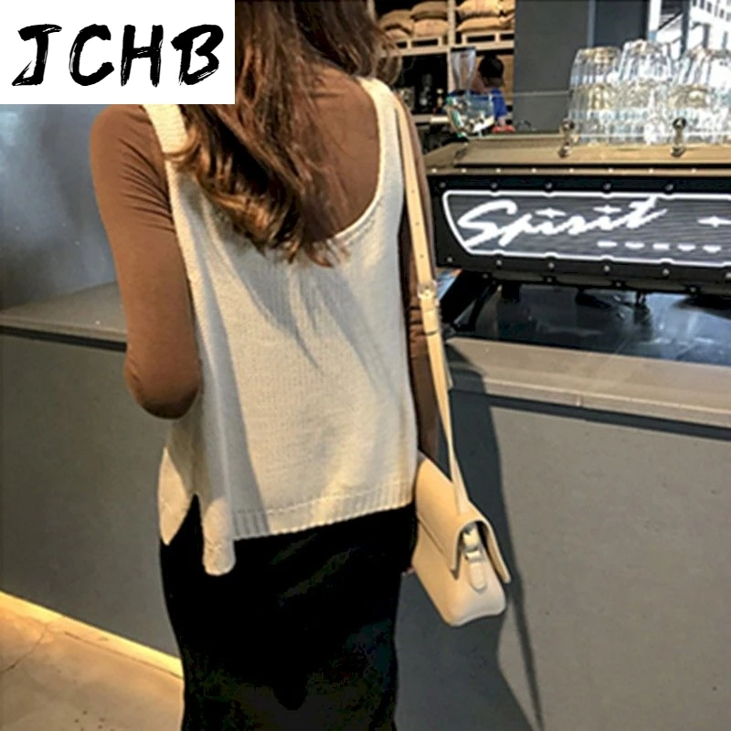 2021 Women Vest Sling Knitted Short Jacket Korean Style Vests Ladies Oversized Autumn Jacket Sleeveless Spring New Fashion Top
2021 Women Vest Sling Knitted Short Jacket Korean Style Vests Ladies Oversized Autumn Jacket Sleeveless Spring New Fashion Top