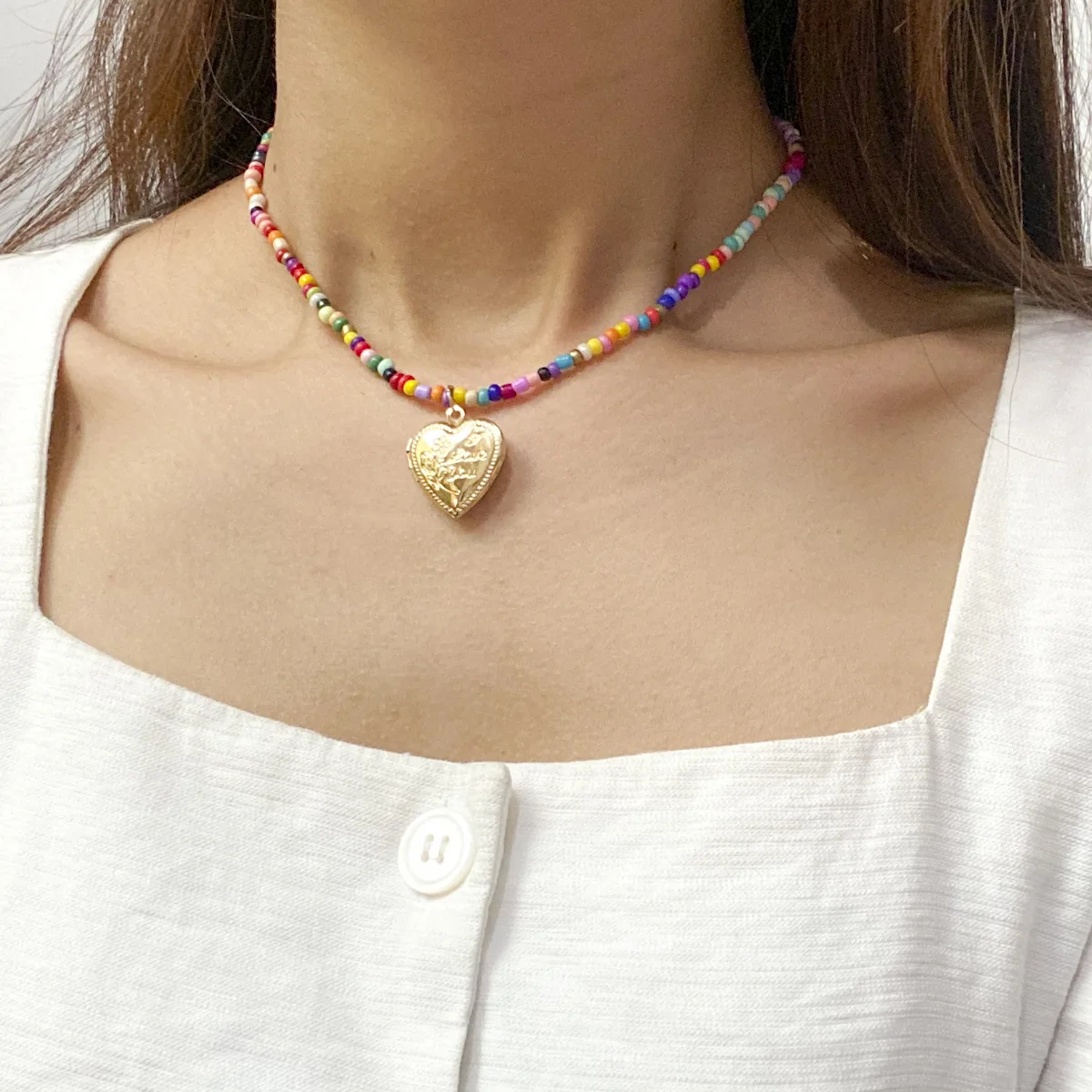 Korean fashion rice bead vintage heart pendant women's bohemian handmade rice bead necklace color jewelry 2021
Korean fashion rice bead vintage heart pendant women's bohemian handmade rice bead necklace color jewelry 2021