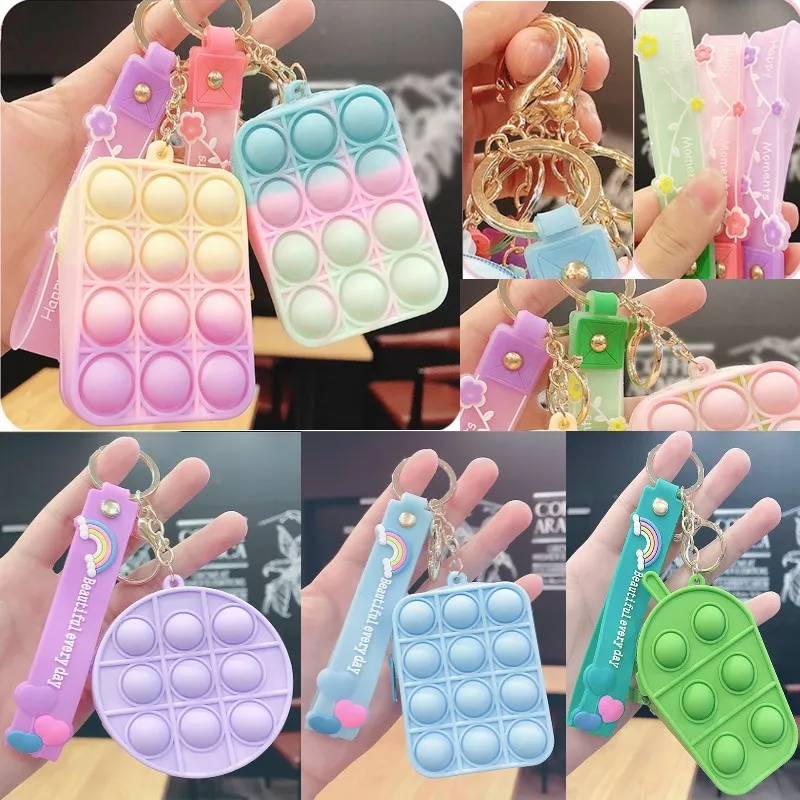 Детская игрушка-антистресс в виде радужной пузырьковой монеты 
Детская игрушка-антистресс в виде радужной пузырьковой монеты