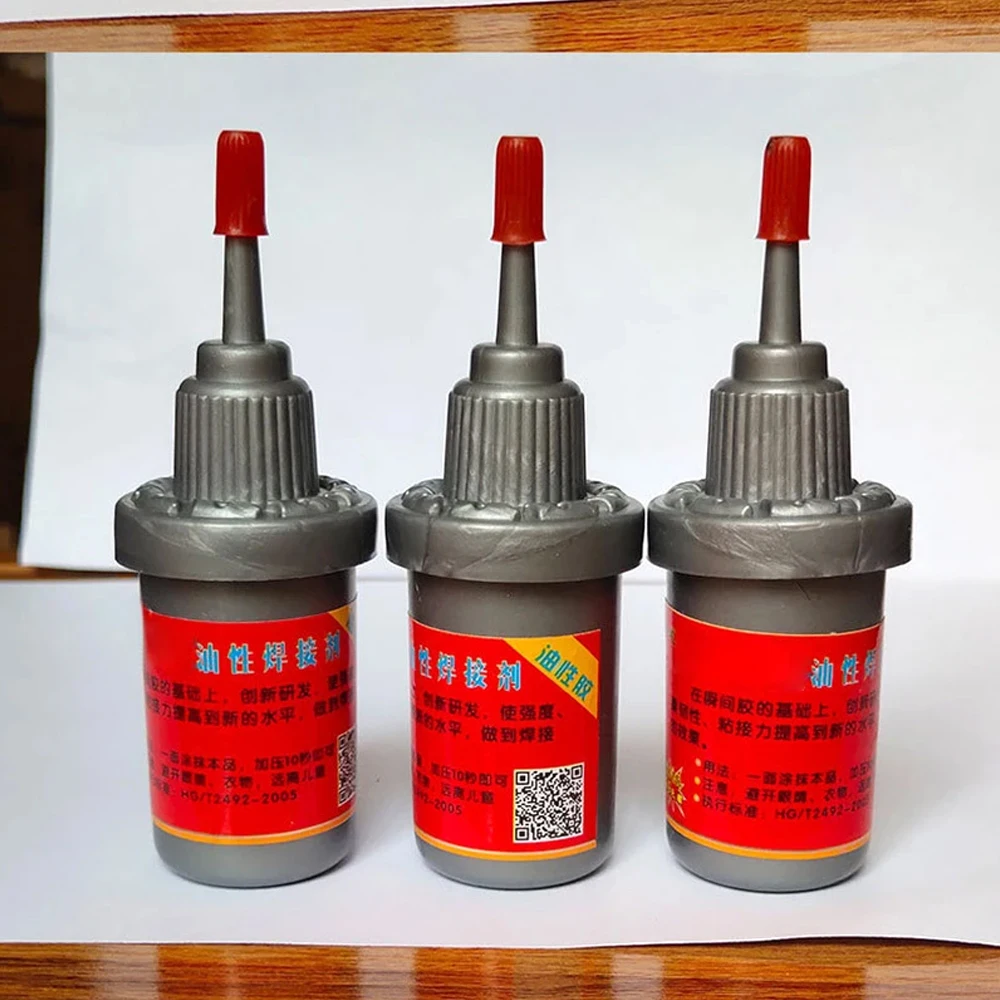 22g Plastic Weld Adhesive Glue Leather Repairing Adhesive Metal Wood Rubber Repair Agent Liquid Multi Purpose Adhesive Glue 
22g Plastic Weld Adhesive Glue Leather Repairing Adhesive Metal Wood Rubber Repair Agent Liquid Multi Purpose Adhesive Glue