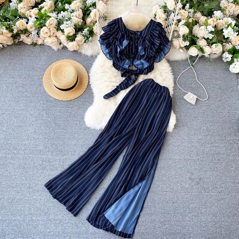 2021 New Vintage Blue Striped Two Piece Set Women Casual V-Neck Ruffle Short Tops + High Waist Split Wide Leg Pants Female Suit
2021 New Vintage Blue Striped Two Piece Set Women Casual V-Neck Ruffle Short Tops + High Waist Split Wide Leg Pants Female Suit