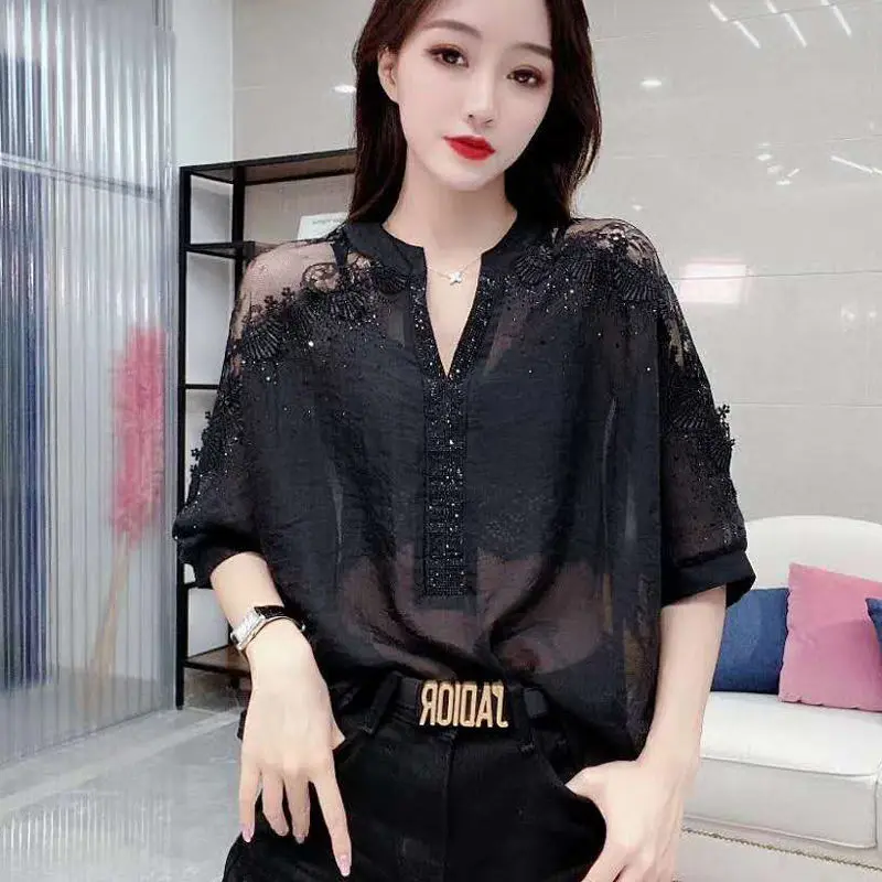 2021 spring and summer new Mini Shoulder bat sleeve V-neck hot drill loose thin short sleeve T-shirt for women
2021 spring and summer new Mini Shoulder bat sleeve V-neck hot drill loose thin short sleeve T-shirt for women