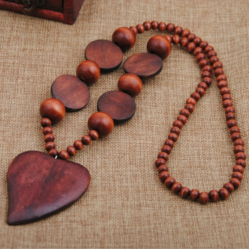 Women Bohemian Style Personality Wood Beads Heart Pendant Long Necklace Handmade Vintage High Quality Necklaces and Pendants
Women Bohemian Style Personality Wood Beads Heart Pendant Long Necklace Handmade Vintage High Quality Necklaces and Pendants