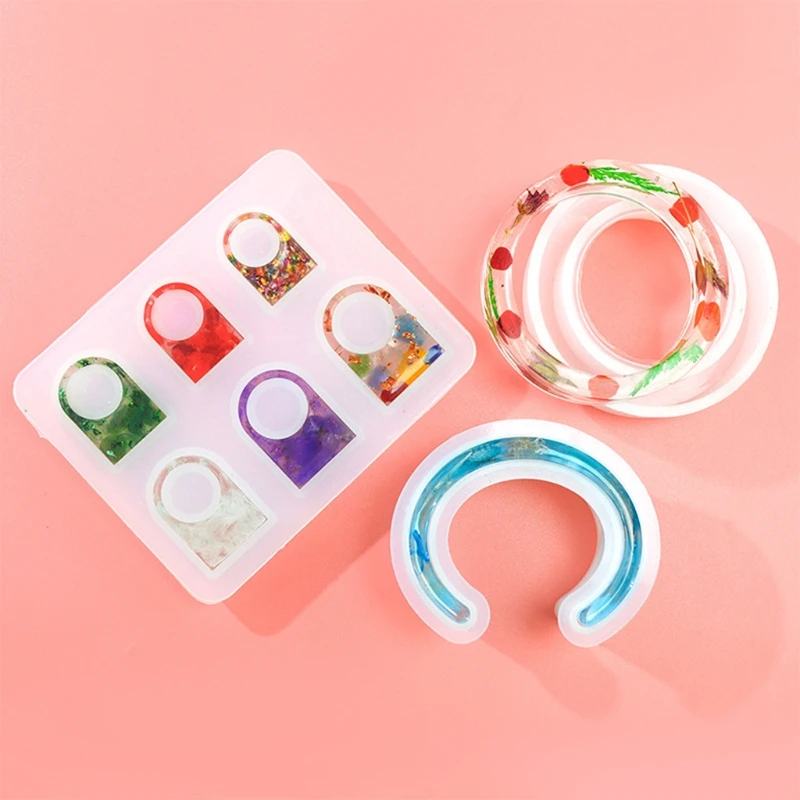 1 Set Rings Bracelet Crystal Epoxy Resin Mold DIY Crafts Jewelry Casting Tool Bangle Silicone Mould 
1 Set Rings Bracelet Crystal Epoxy Resin Mold DIY Crafts Jewelry Casting Tool Bangle Silicone Mould