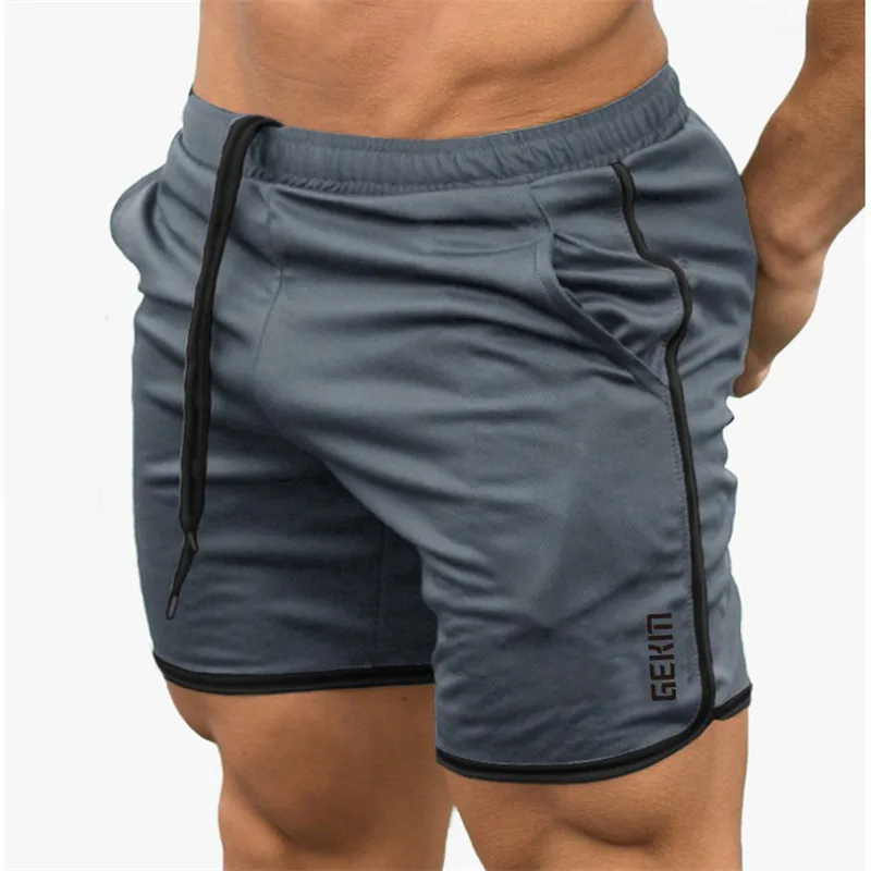 

erano de 2021 gimnasios Fitness caliente pantalones cortos de los hombres pantalones cortos de Color liso de los hombres de vera