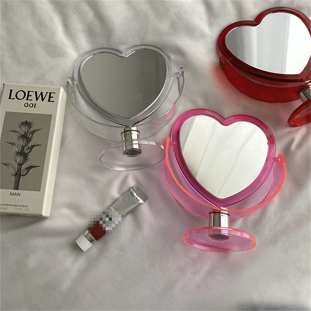 2021 Acrylic Double Side Makeup Mirror Cute Heart Shaped Cosmetic Mirror Transparent Base Home Bedroom Desktop Make Up Mirror
2021 Acrylic Double Side Makeup Mirror Cute Heart Shaped Cosmetic Mirror Transparent Base Home Bedroom Desktop Make Up Mirror