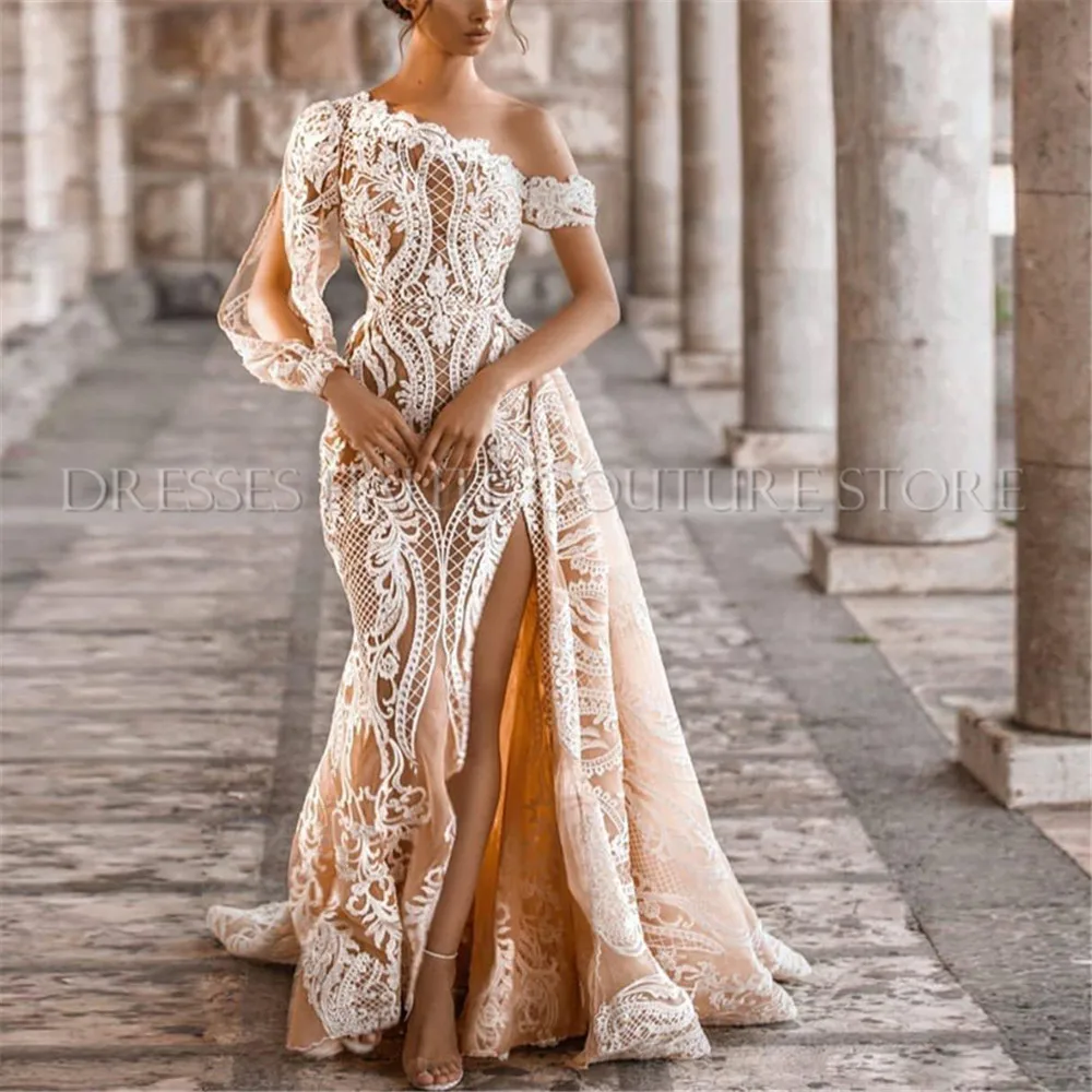 New Arrival One Shoulder Side Split Mermaid Lace Wedding Dresses Full Sleeve Pearls Champagne Country Wedding Gowns Sweep Train 
New Arrival One Shoulder Side Split Mermaid Lace Wedding Dresses Full Sleeve Pearls Champagne Country Wedding Gowns Sweep Train