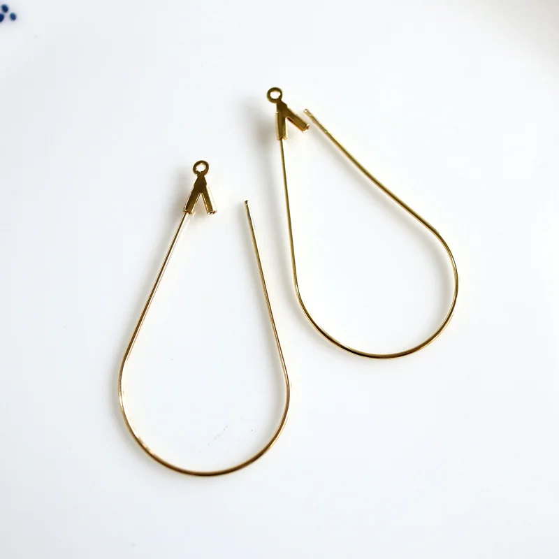 wholesale 20 pcs/lot gold plated ear wires water drop pendants split open jewelry making craft findings DIY for women
wholesale 20 pcs/lot gold plated ear wires water drop pendants split open jewelry making craft findings DIY for women