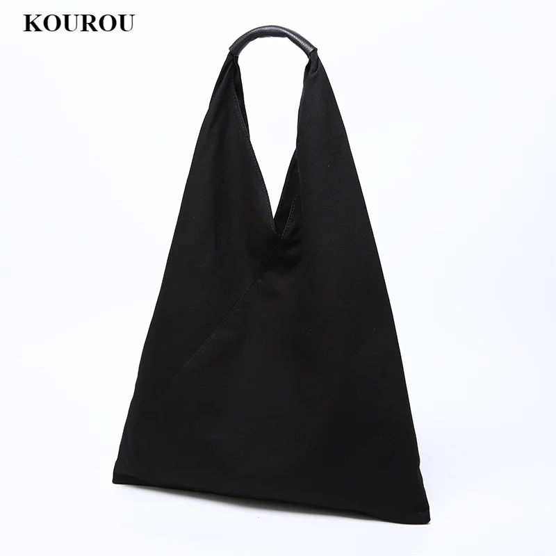 Korean version of ins lazy style large capacity Hong Kong style shoulder bag 2021 new handbag splicing casual canvas bag
Korean version of ins lazy style large capacity Hong Kong style shoulder bag 2021 new handbag splicing casual canvas bag